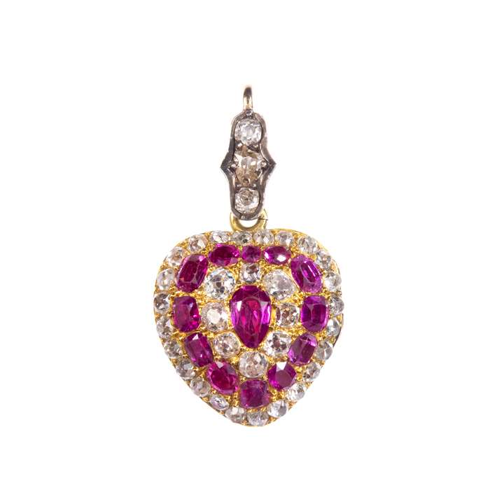 Ruby, diamond and enamel heart pendant, of bombe form, the front with target cluster